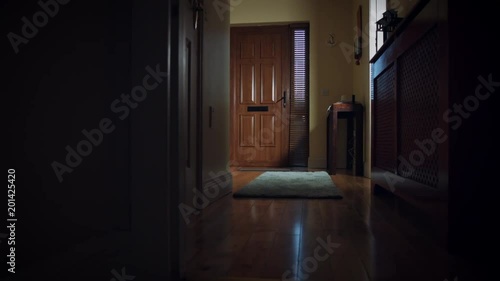 4k Dolly of House Front Door, Child Running after Post photo