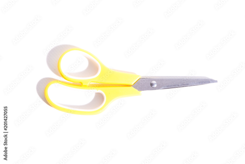 Yellow scissors isolated on a white background Yellow scissors isolated on a white background