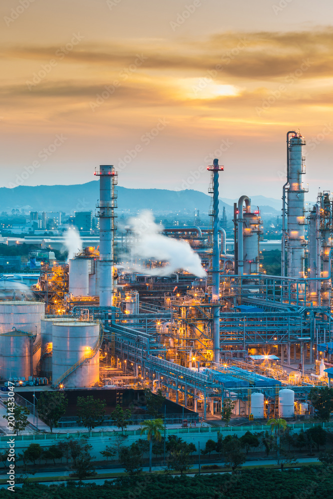 Petroleum refinery industry plant with lighting on twilight time