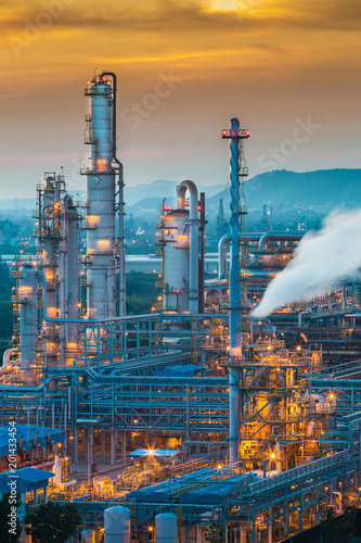 Oil refinery plant with twilight color sky