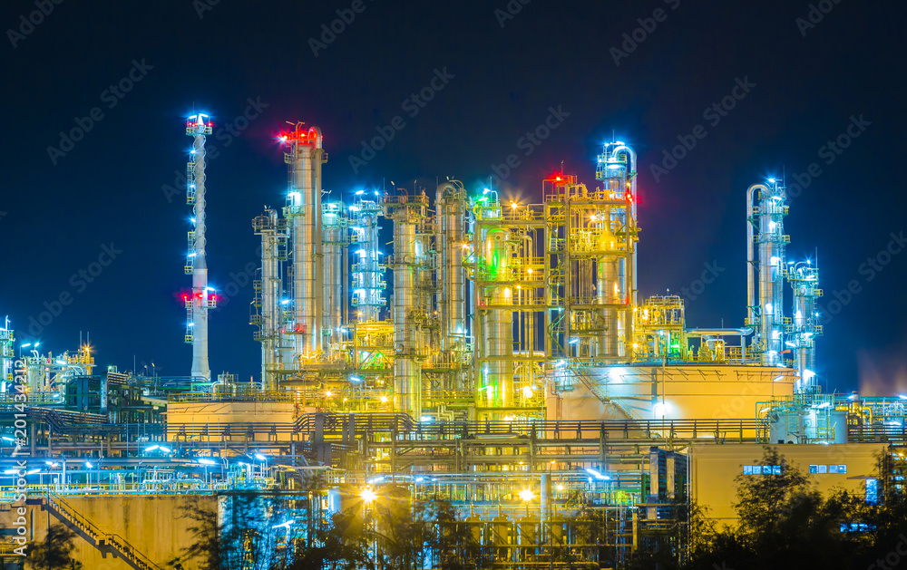 Petroleum refinery industry plant with lighting on twilight time