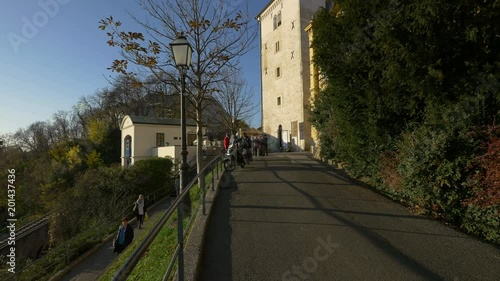 People on alleys near Lotr≈°ƒçak Tower in Zagreb photo