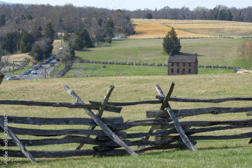 Slika na platnu he Stone House and split rail fences at right are part of the Manassas National Battlefield Park, scene of fierce fighting at the First Battle of Bull Run