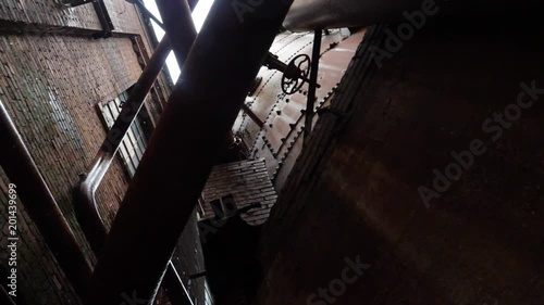 Panning vertical scene of old abandoned warehouse