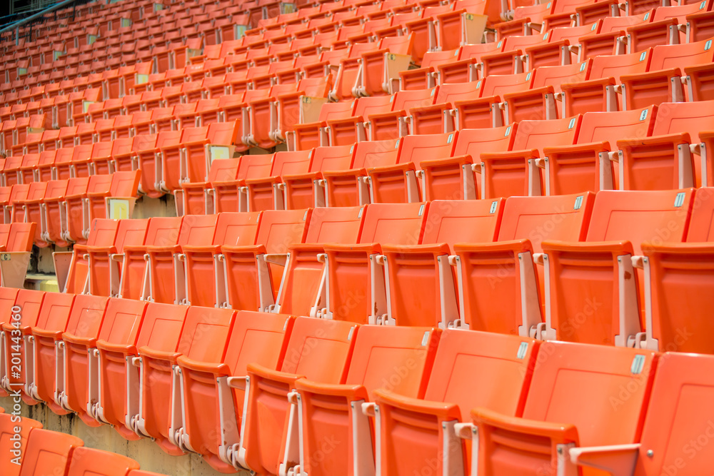 Many chairs in football stadium. Many chairs in football stadium.
