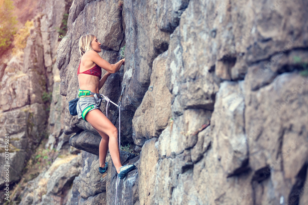 girl climbs the rock girl climbs the rock