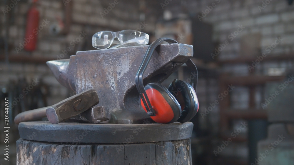Forge workshop - hammer, anvil and protect headphones