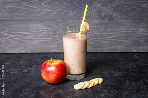 Banana and apple milk smoothie with ingredients