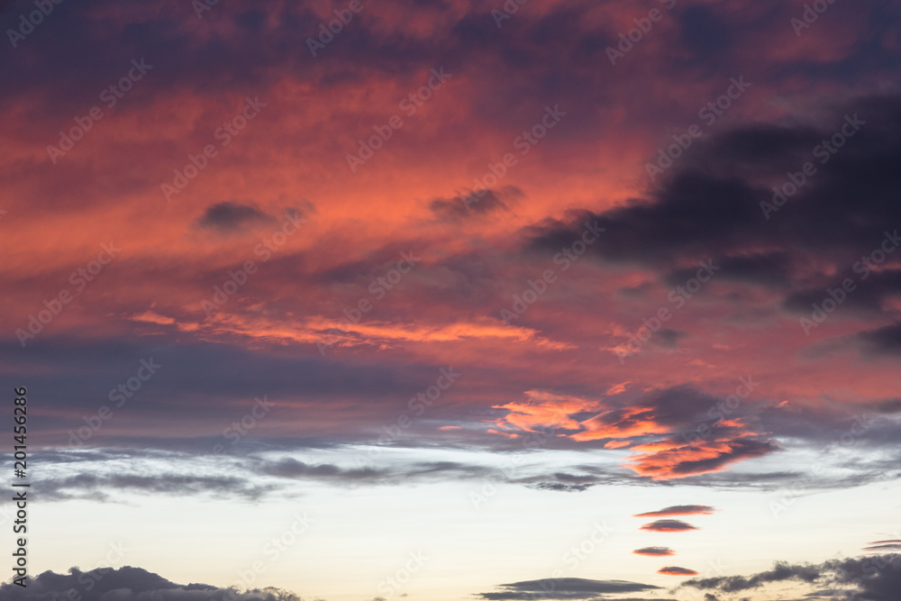 Beautiful red clouds at sunset, making abstract shapes