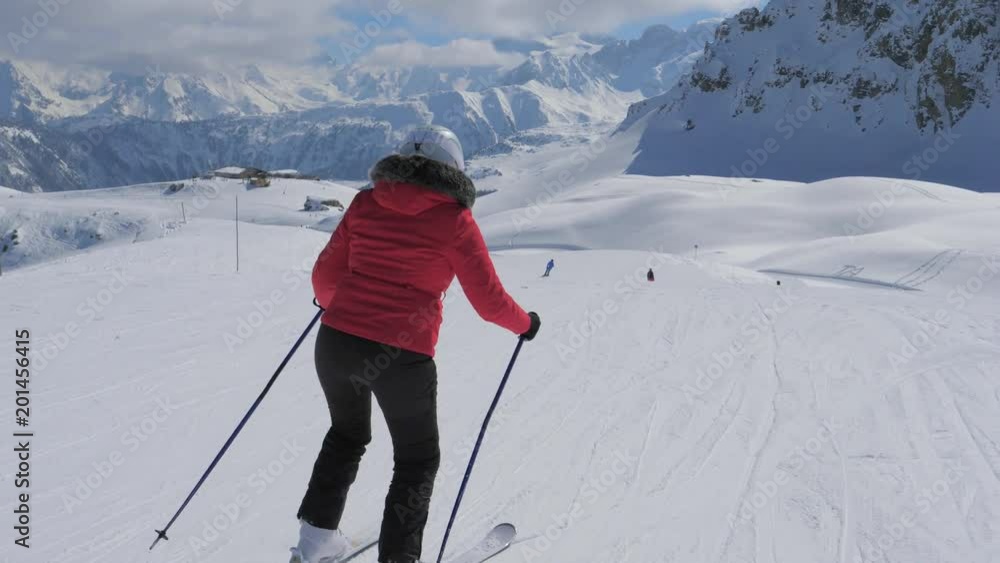 Woman Skier Skiing Down Mountain Slope She Pushing Sticks Sit Down To Gain Speed Woman Skier Skiing Down Mountain Slope She Pushing Sticks Sit Down To Gain Speed