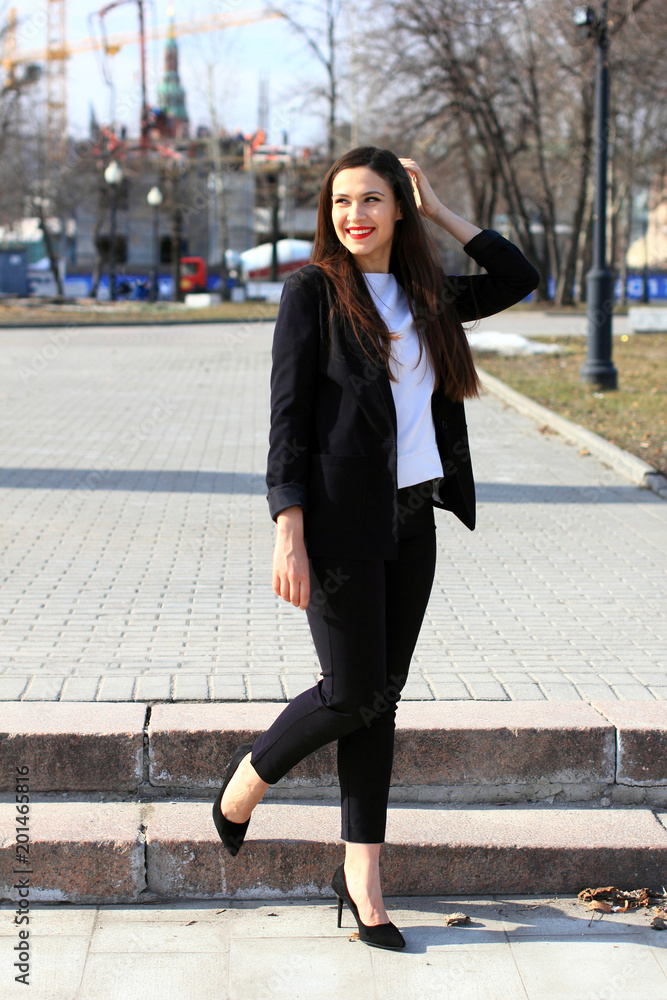 Portrait of young smiling successful business woman. People, cute, outdoor. Happy emotional beautiful girl laughing at the camera. Portrait of young smiling successful business woman. People, cute, outdoor. Happy emotional beautiful girl laughing at the camera.