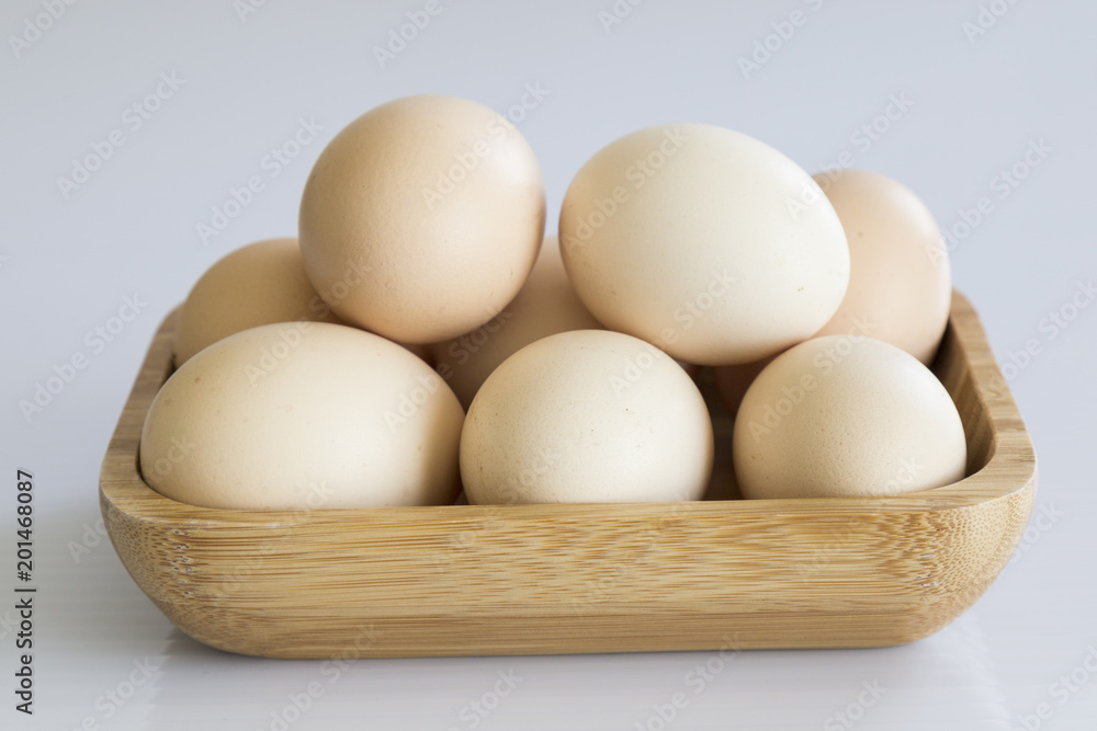 isolated eggs on the ground. eggs concept for kitchen art.