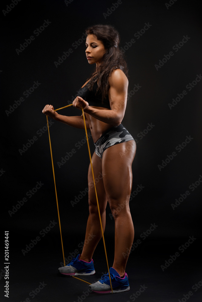 Foto Stock Perfect Fitness Body of Beautiful Woman. Fitness Instructor in  Sports Clothing. Female Model with Fit Muscular and Slim Body in Sportswear  doing Workout. Fit Lady. Front View | Adobe Stock