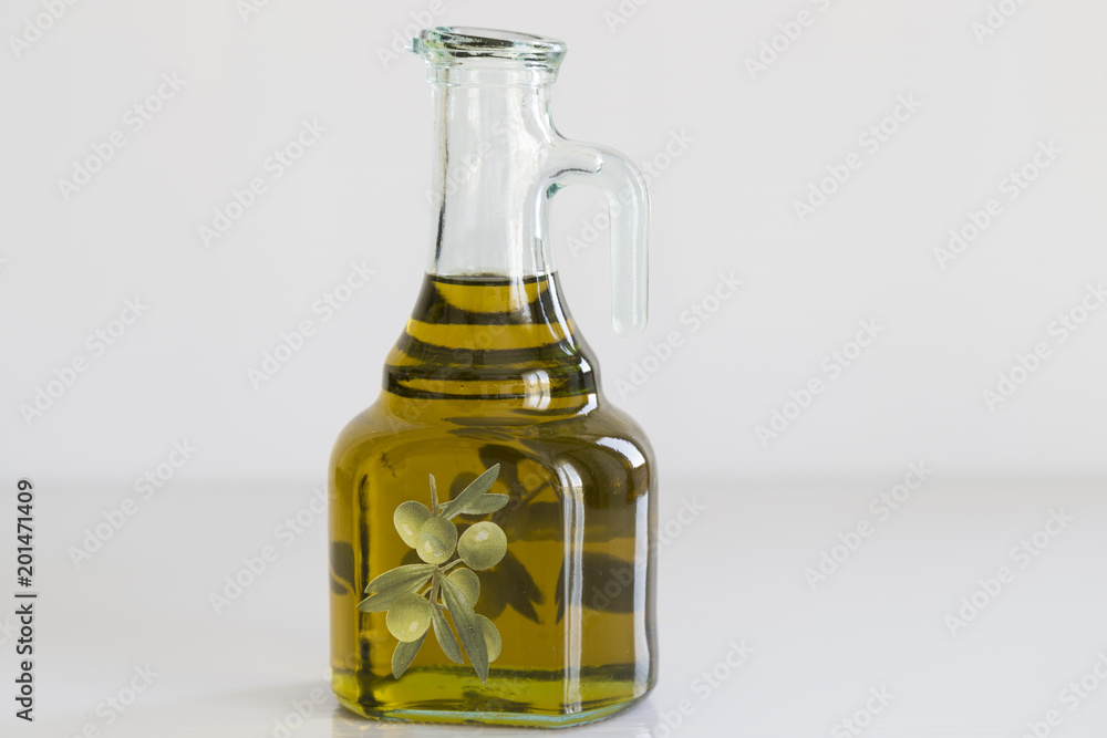 Olive oil concept with bottle . Eat olive oil for a healthy life.