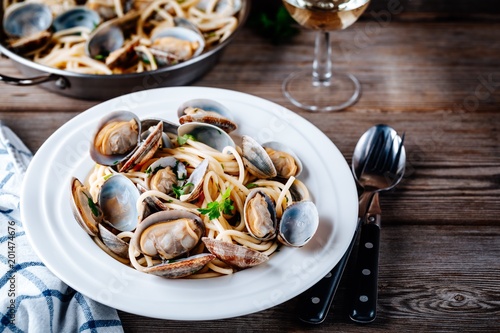 Traditional italian seafood pasta with clams Spaghetti alle Vongole photo