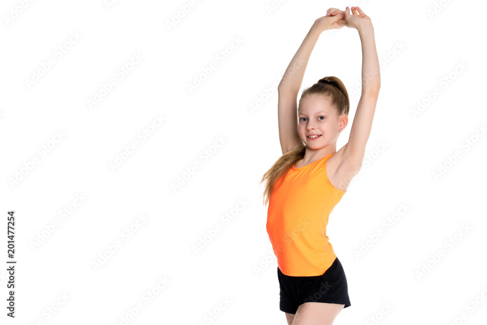 A teenage girl is engaged in fitness. A teenage girl is engaged in fitness.