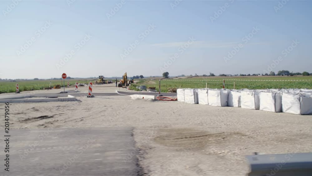 Driving by a Construction Site Car Side View Slow Motion 4K