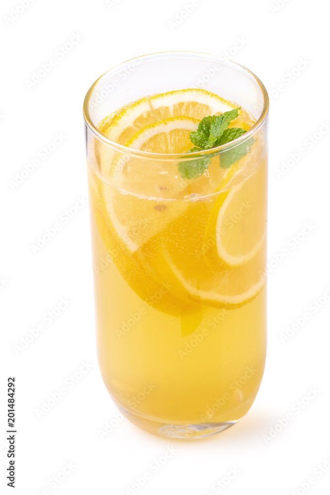 Lemon juice with honey isolated on a white background.