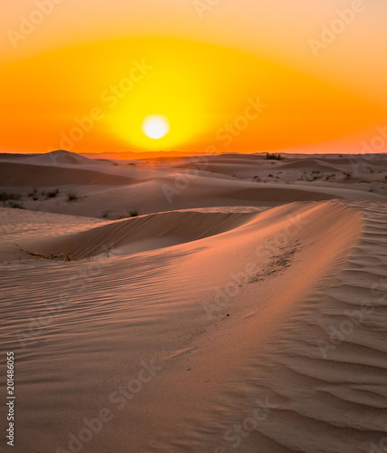 Beautiful exposure done in the desert with its colorful red color over sunset over the sands dunes