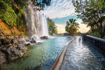Fotobehang Nice Waterval in Parc de la Colline  © Valery Bareta