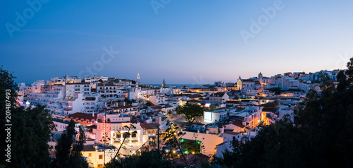 Panoramic, night view of the Old Town of Albufeira City in Algarve, Portugal. Albufeira is a coastal city in the southern Algarve region of Portugal. 