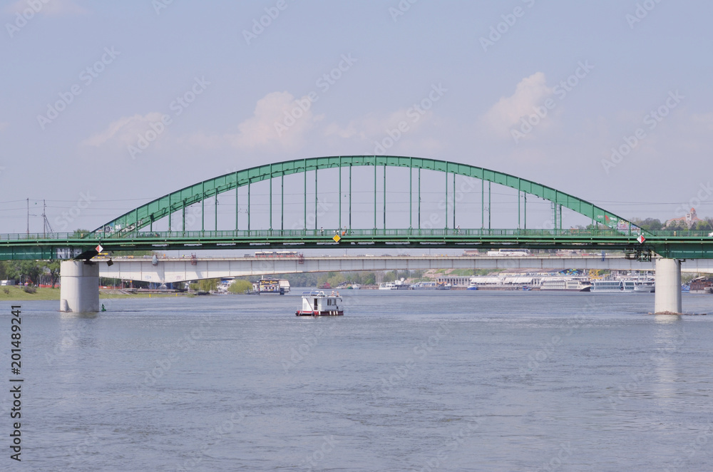 Obraz premium metal bridge on the river