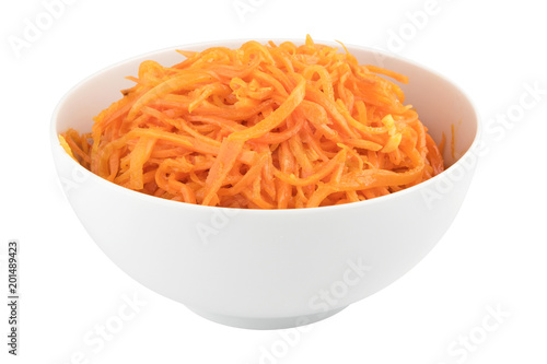 Picked hot carrot with spices in white bowl, traditional asian foodm isolated on white