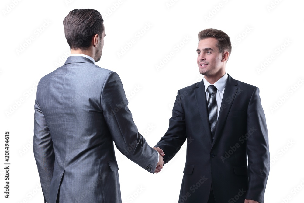 handshake of two new business partners handshake of two new business partners