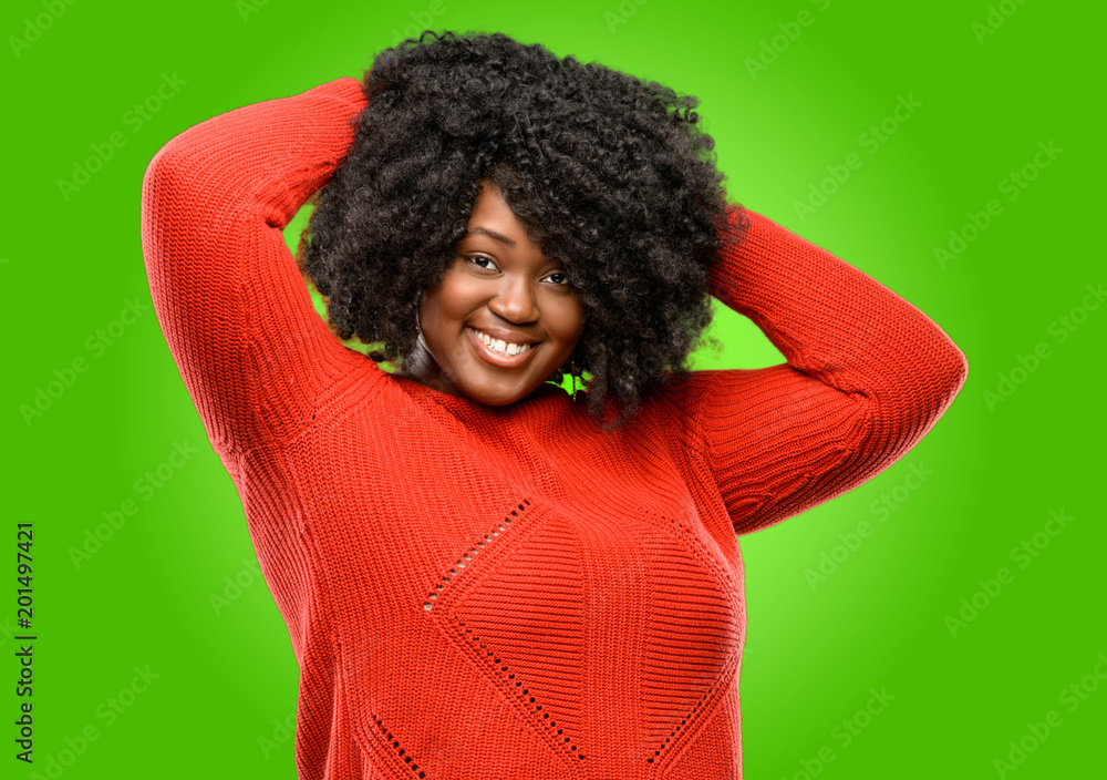 Beautiful african woman confident and happy with a big natural smile laughing Beautiful african woman confident and happy with a big natural smile laughing
