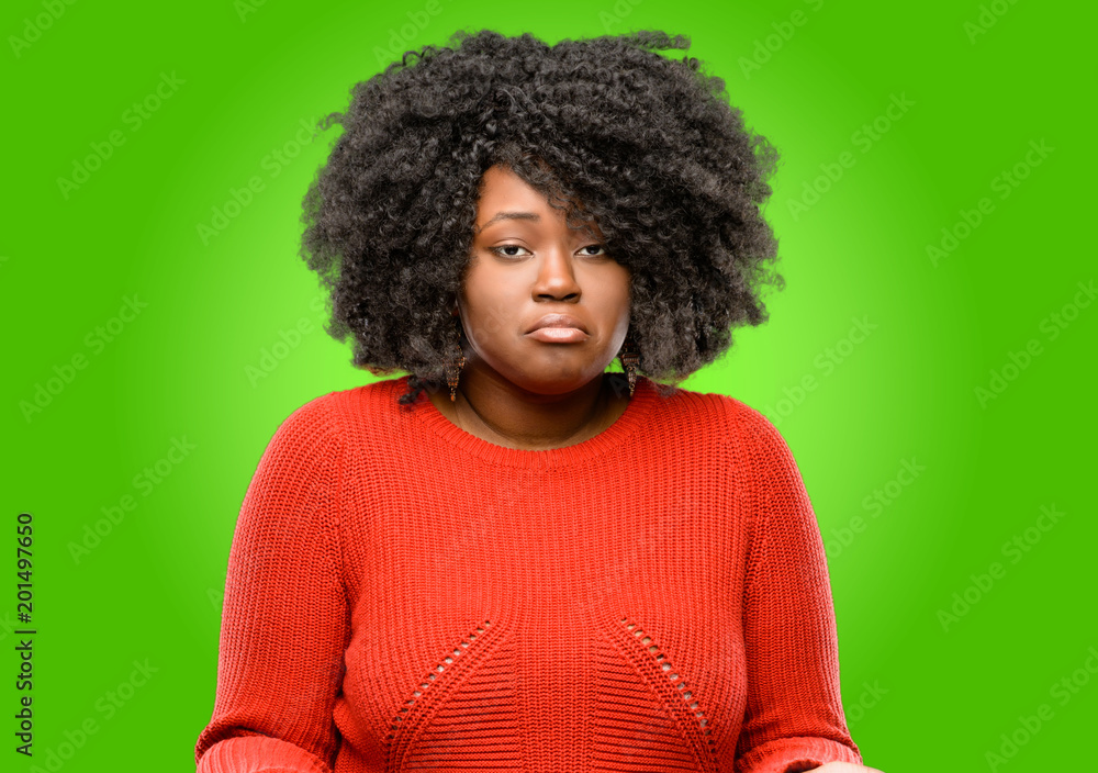 Beautiful african woman doubt expression, confuse and wonder concept, uncertain future Beautiful african woman doubt expression, confuse and wonder concept, uncertain future