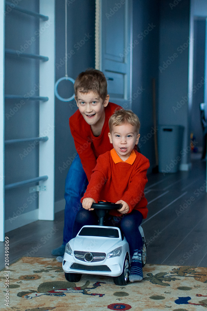 Baby riding a car store