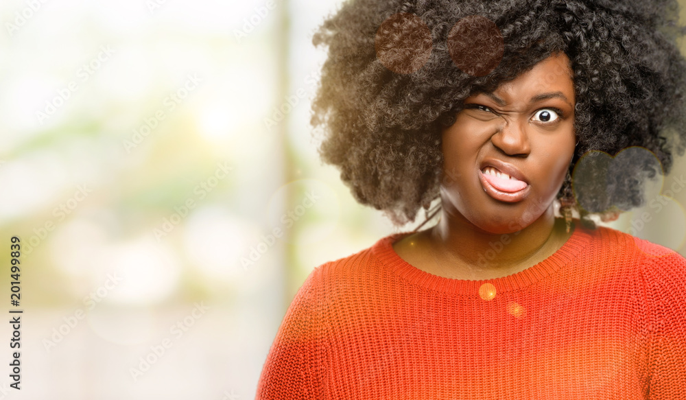 Beautiful african woman making funny face fooling, outdoor Stock Photo |  Adobe Stock