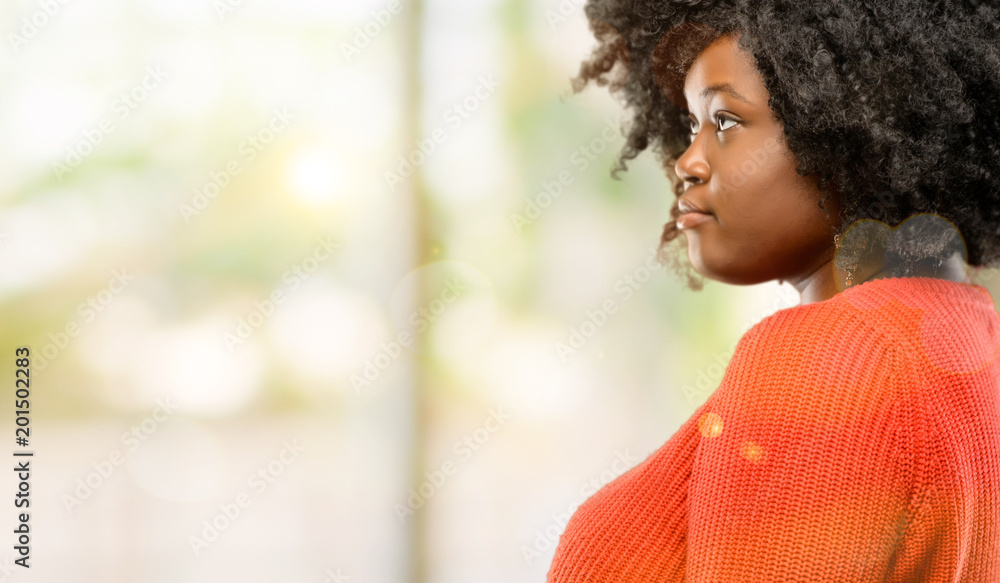 Beautiful african woman side view portrait, outdoor Beautiful african woman side view portrait, outdoor