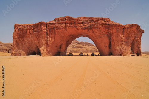 Tourists having lunch under File:Elephant Rock in the Ennedi Mountains - northeastern Chad  photo