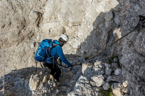 Mountaineer climbing in mouintains.