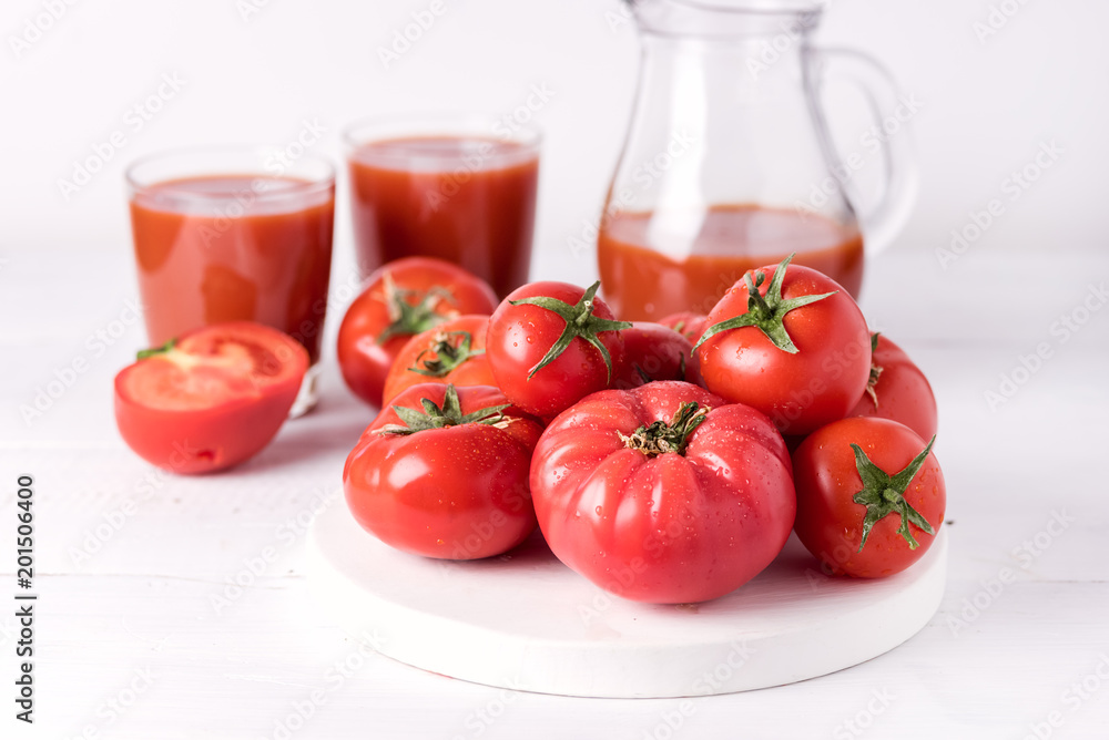 Glasses of Tasty Tomato Juice with Raw Tomatoes on White Wooden Background Healthy Diet Detox Drink