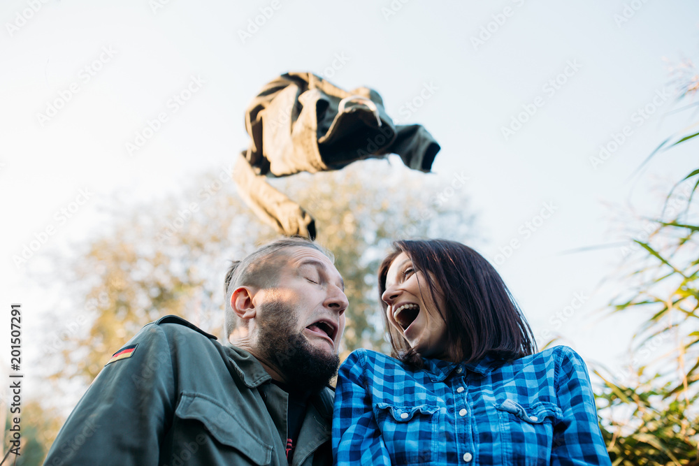 © dimadasha - Walk a guy and a girl. Love story by the lake in the tall grass. Youth in nature. © dimadasha - Walk a guy and a girl. Love story by the lake in the tall grass. Youth in nature.