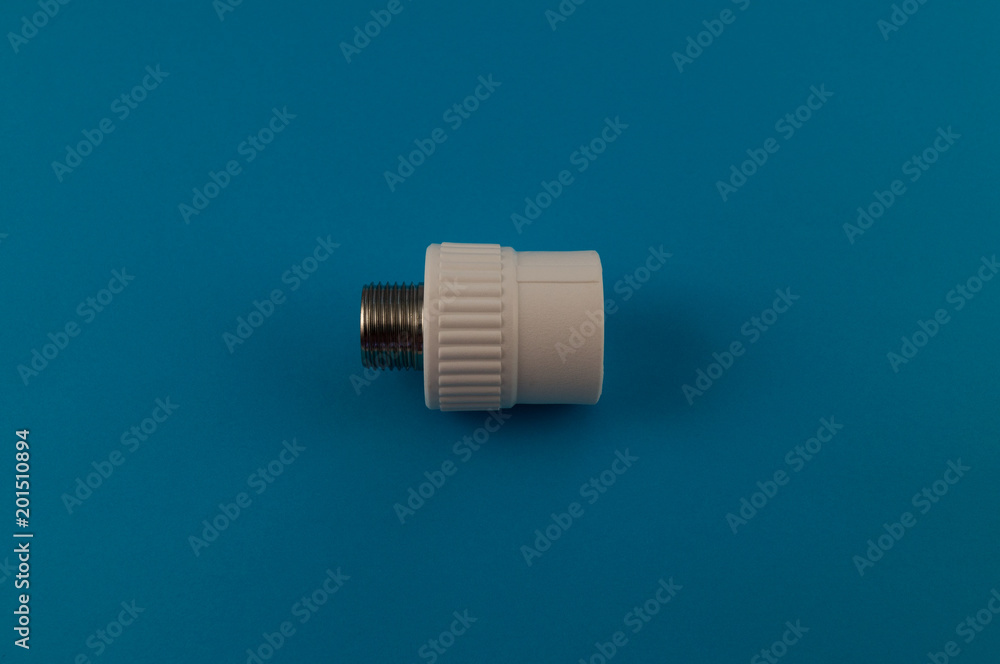 The fitting for the installation of a water pipe is a metal-plastic clutch with an external connecting thread. The fitting for the installation of a water pipe is a metal-plastic clutch with an external connecting thread.