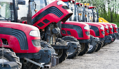 Obraz na plátně many tractors on the farm