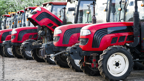 Fotografie many tractors on the farm