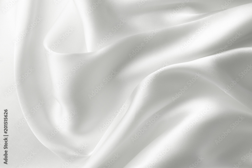 Elegant white satin silk with waves, abstract background Elegant white satin silk with waves, abstract background
