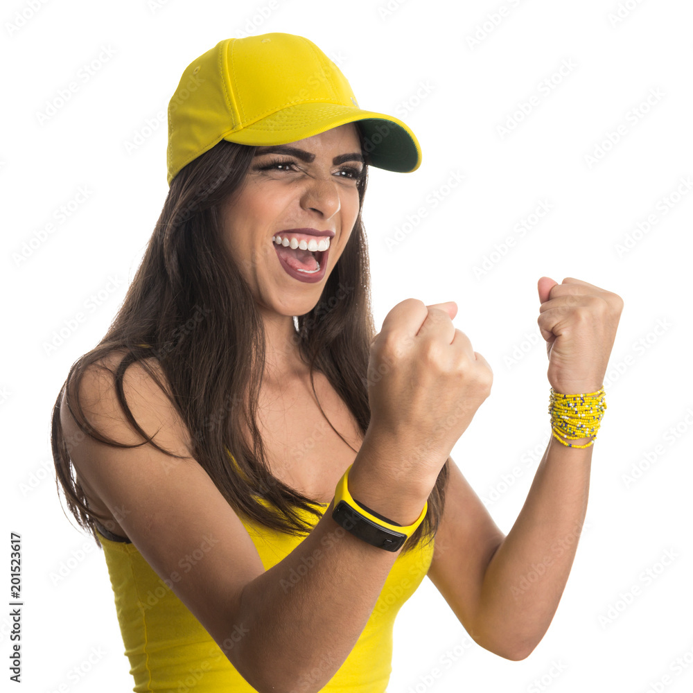 Brazilian woman fan celebrating on soccer match on white background. Brazilian woman fan celebrating on soccer match on white background.