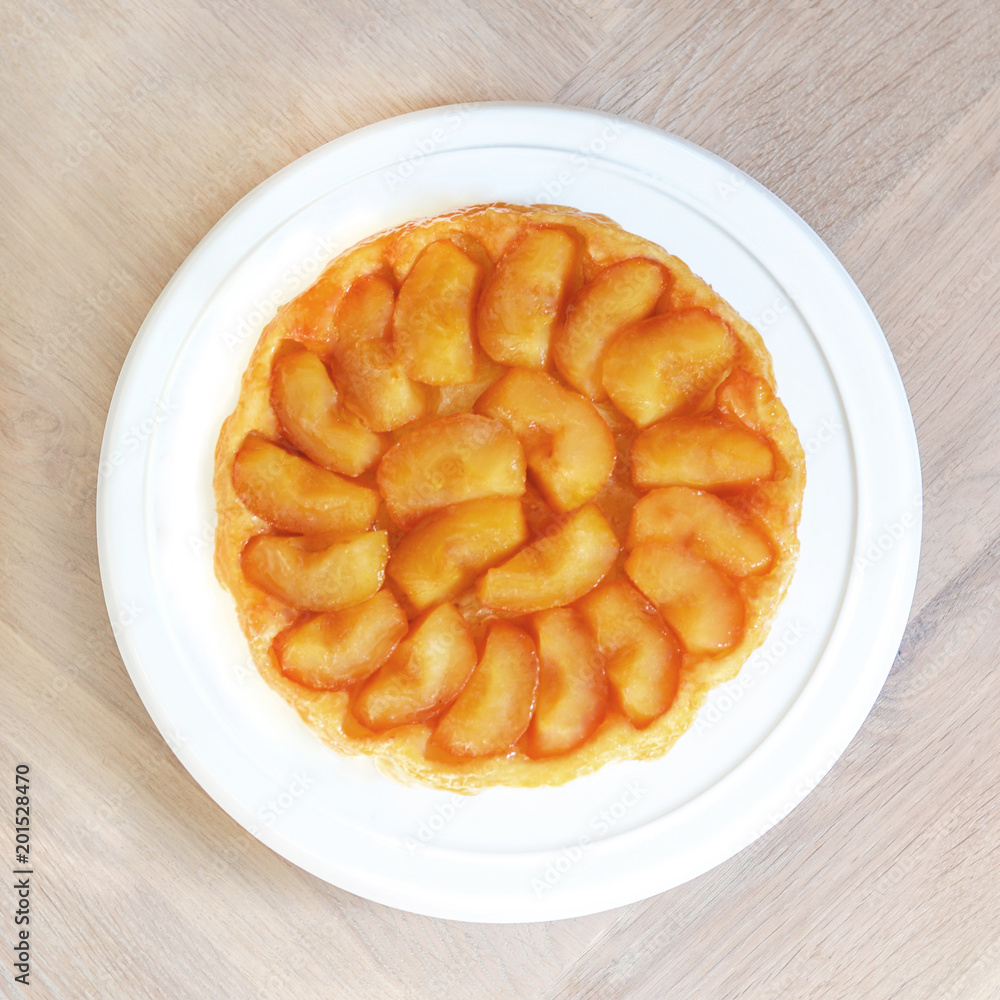 French tatin pie on white plate French tatin pie on white plate