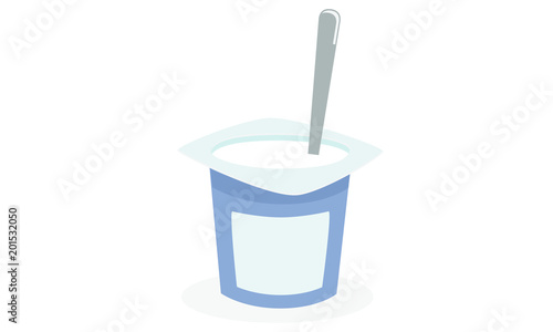 Natural yogurt with spoon inside