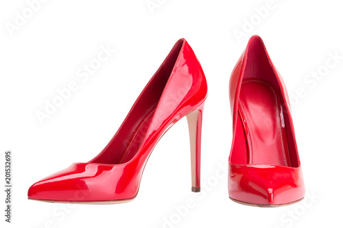 Red female shoes on a white background