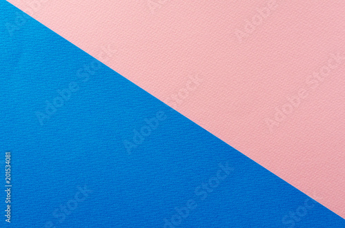 Colored geometric blue and pink paper texture background.