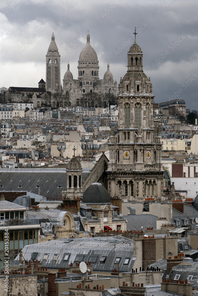 Sacre-Coeur above the rooftops of Paris.
