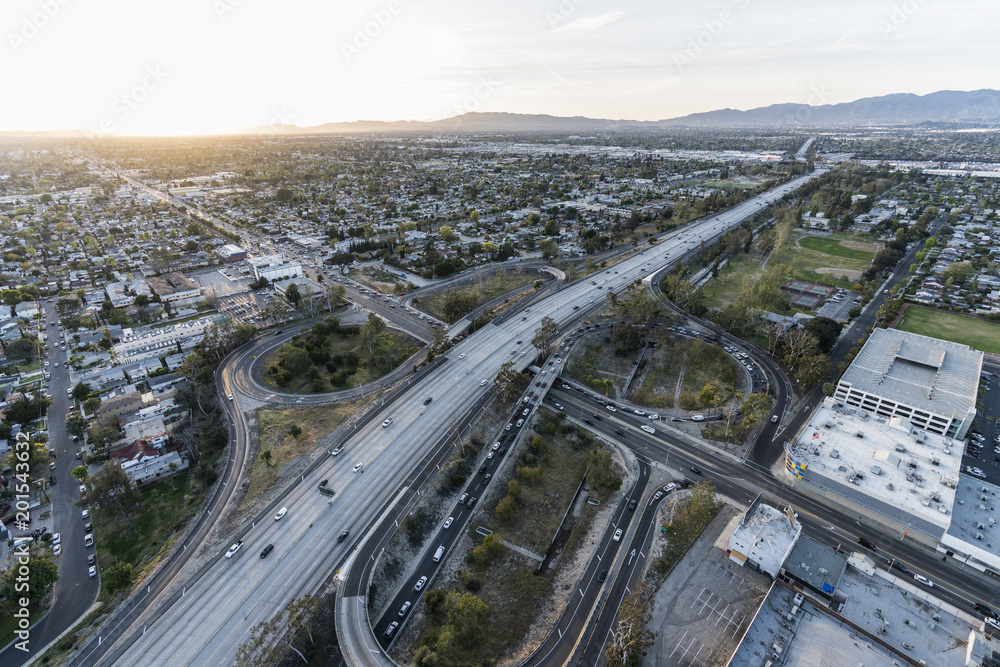 Late afternoon aerial of the Hollywood 170 freeway at Victory Bl in the San Fernando Valley area of Los Angeles, California.