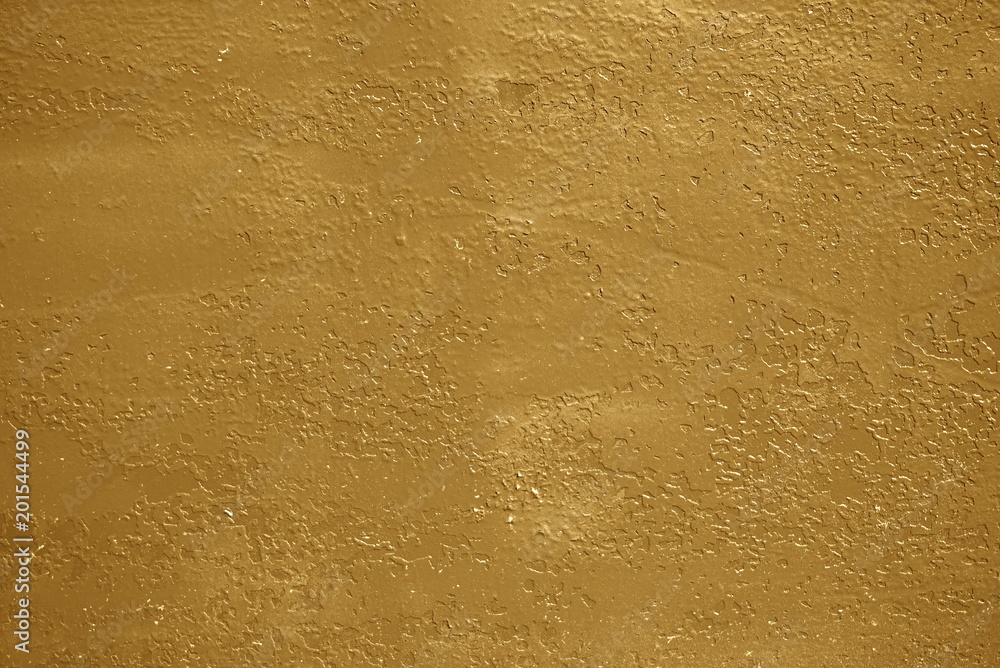 fragment of an iron surface is covered with beige color paint fragment of an iron surface is covered with beige color paint