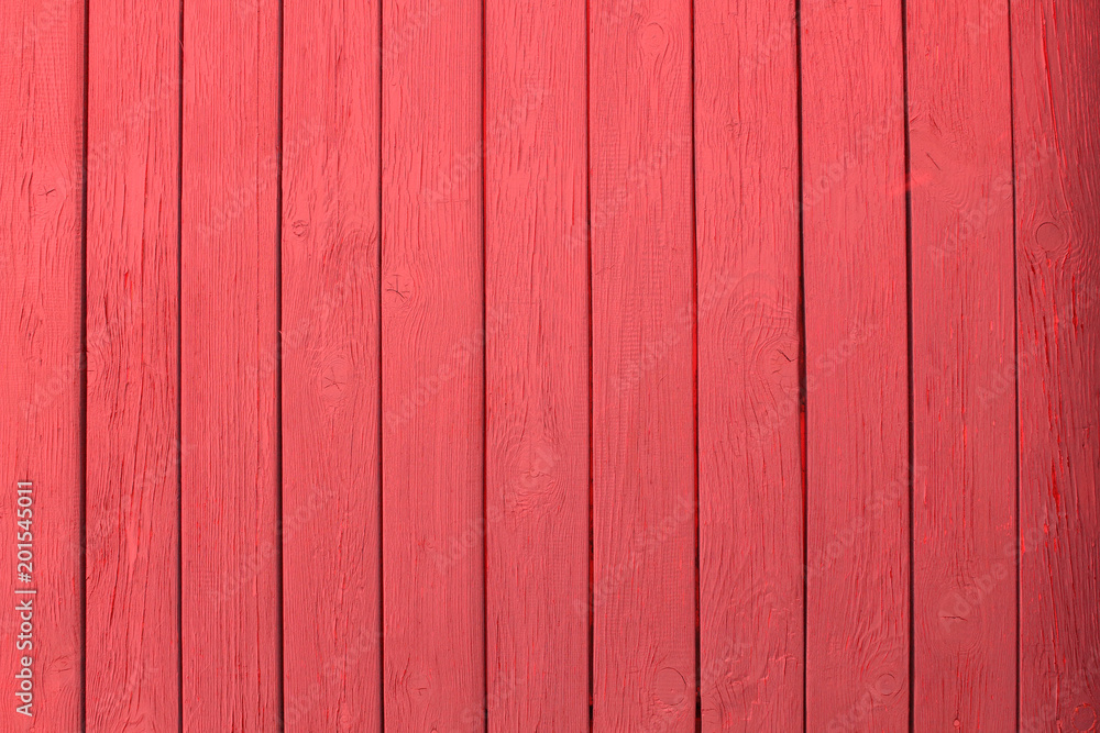 Wall of wooden boards painted in red. Background. Texture. Wall of wooden boards painted in red. Background. Texture.